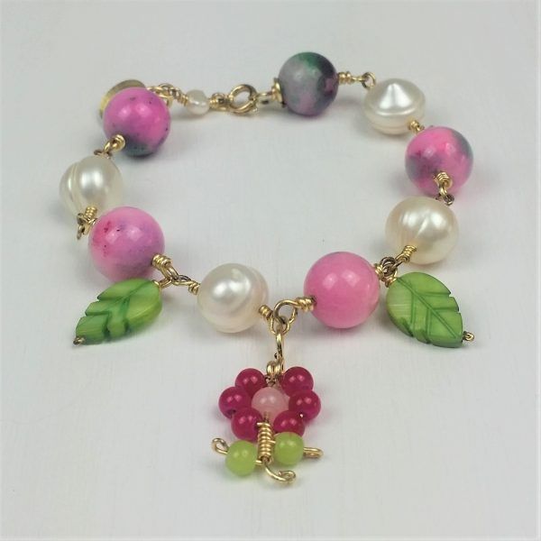 PULSERA CON AGATAS ROSA PERLAS Y FLOR